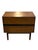 This vintage mid-century modern accent table features a clean, rectangular case design with a warm walnut-toned finish and...