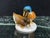 Hutschenreuther (Germany) hand-painted porcelain figurine of two adult mallard ducks and a duckling, with an iridescent...