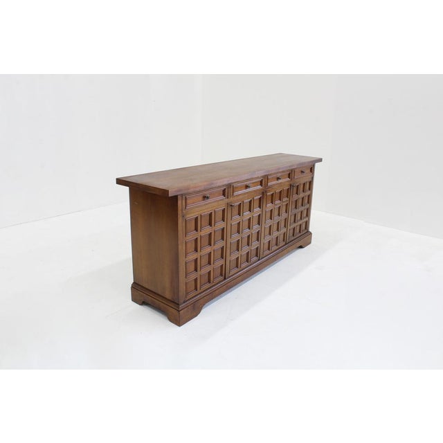 Vintage brutalist wooden sideboard with geometrical carved wood pattern. Italian brutalist design from the 1960s. Large...