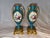 Elegant matched pair of antique French porcelain cabinet vases with turquoise ground and richly gilt decoration. Each vase...