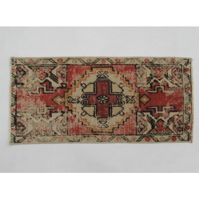 Vintage handknotted decorative mini rug from Konya region of Turkey. Approximately 50-60 years old. In very good condition.