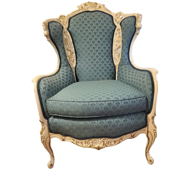 Grandmother's Vintage Wingback Chair. Reupholtered. Bought in 1940s. Hand-Carved. Unique carvings on the side of the...