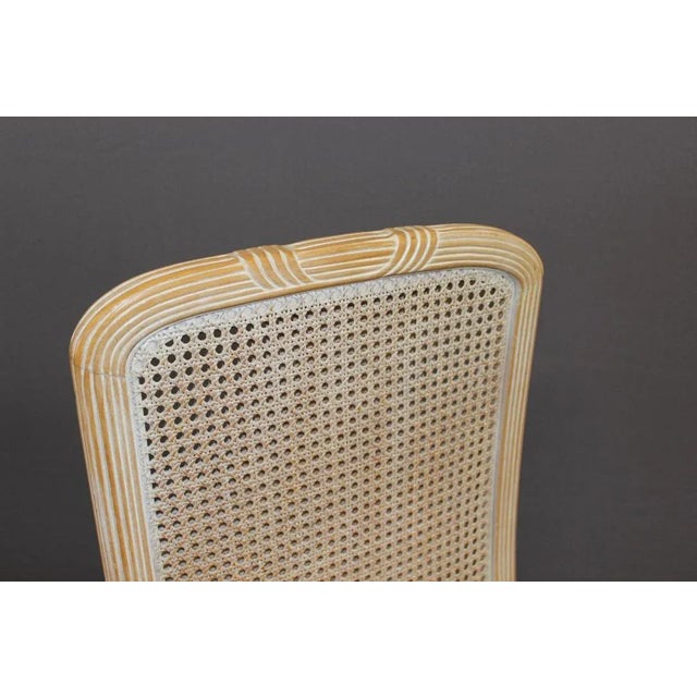 Set of six design chairs from the late 1970s, in beech wood with white patina, double wickerwork in the backrests, fabrics...