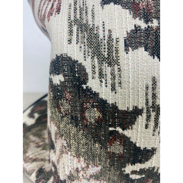 This is a pair of modern brocade pillows with a explosive starburst pattern to the center. These pillows have a black...