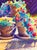 Why This Work Matters Flowers in Terracotta Pots captures the pleasure of a sunlit garden through saturated color,...