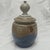 The Paul Anthony Pottery Stoneware Pottery Jar with Lid is a vintage piece of art pottery from the 1960’s. Handmade in the...