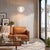 The Float Chairside Arc Lamp is a striking arc lamp combining a weathered brass steel body with a matching steel base for...