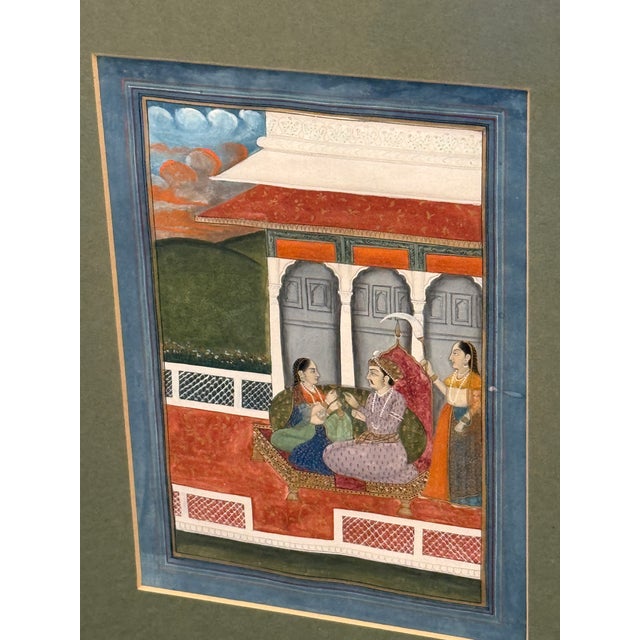 Design Plus Gallery presents a Miniature Painting of an Emperor with Woman in a Palace Setting. the artwork is detailed...