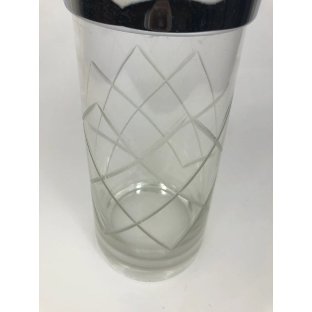 Vintage Heavy Crystal Cocktail Shaker With Wheel Cut Argyle Design and unusual flared silver top and pour spout. Shaker is...