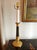 Single d'ore gilt bronze candlestick wired as a lamp. Mostly likely a period piece or near by in time, this candle stick...