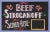 Colorful vintage, one-sided, hand-painted sign on chipboard saying "Beef Stroganoff". Wear, discolorations.