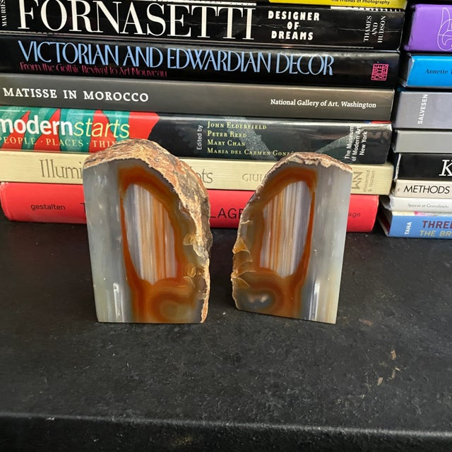 Pair of lovely agate bookends. Made in Brazil. Both are in great shape. Can be displayed from various sides. No padding on...