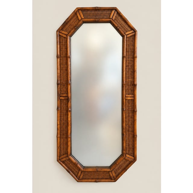 Offered is a monumental vintage faux bamboo and wicker American of Martinsville mirror. These were purchased from an...