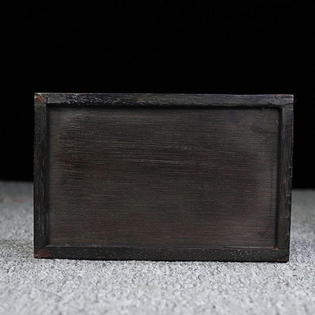 A graceful Chinese hardwood slide-out drawer box crafted from warm, deep-toned huali rosewood, its surface showing rich...