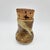 Tall waisted stoneware jar with layered brown and cream drip glaze, fitted natural cork stopper, signed "LAIR" on base