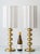 A sculptural pair of Swedish mid-century modern brass table lamps by Aneta, featuring stacked globe (bobbin) stems and new...