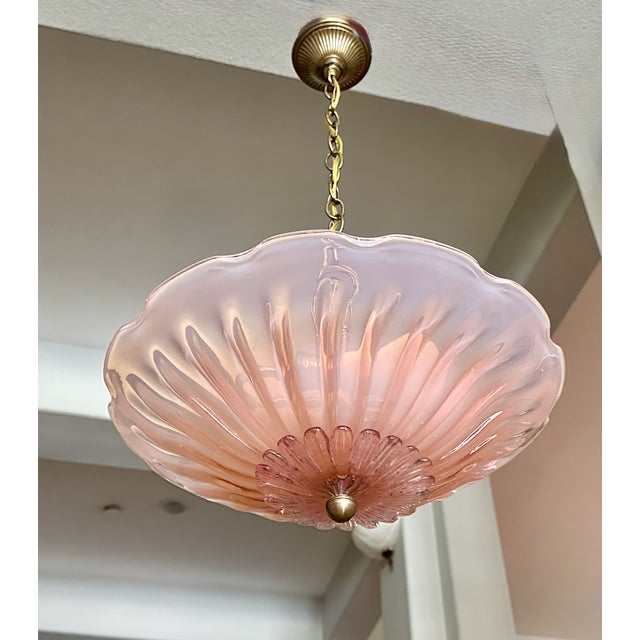 Murano Italian hand blown pink opalescence round scallop edge pendant or chandelier ceiling light. The decorative...