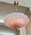Murano Italian hand blown pink opalescence round scallop edge pendant or chandelier ceiling light. The decorative...