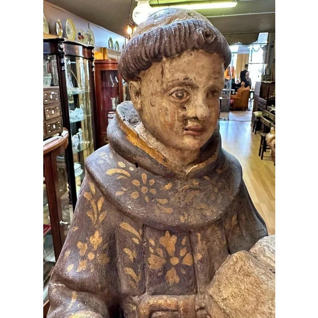 Spanish Sculpture of the 17th century "Saint Antony and the Child Jesus" Measures: H: 61cm, polychrome and gilded wood....