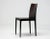 A set of six anna r dining chairs designed by ludovica and roberto palomba for crassevig. These chairs feature a dark...