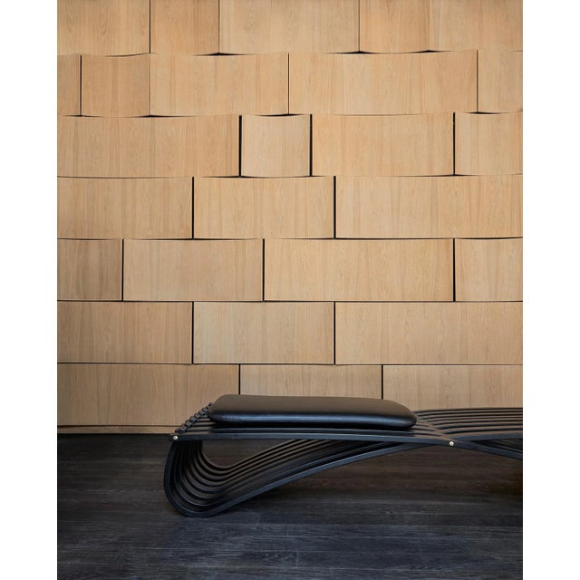 JUNDO daybed with black painted beech base and with 3 cushions in black Optimo leather from Sorensen. Jundo is Japanese...