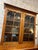 Handsome solid Walnut antique secretary. This exquisite late 1800s Empire-style secretary is crafted from rich walnut and...