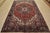An authentic vintage traditional tribal Heriz rug, hand-knotted with fine wool and natural dyes. This rug features a...