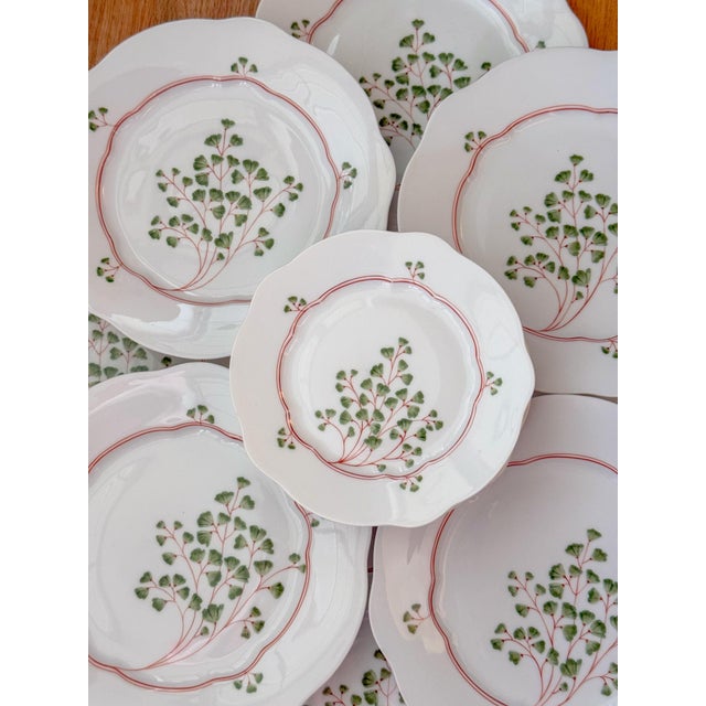 Absolutely stunning set of antique dinner plates by Nymphenburg and designed by Max Rossbach and Hermann Gradl. This is a...