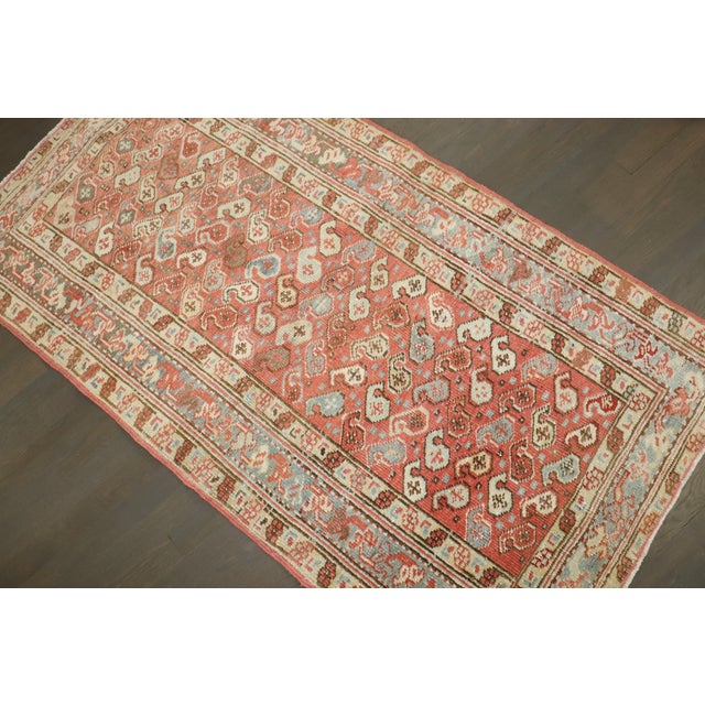 an early 20th century scatter size persian Heriz rug featuring an all-over small paisley pattern Details rug no. j3487...