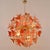 A spectacular contemporary italian sputnik chandelier, entirely handcrafted with an elaborate polished brass frame and a...