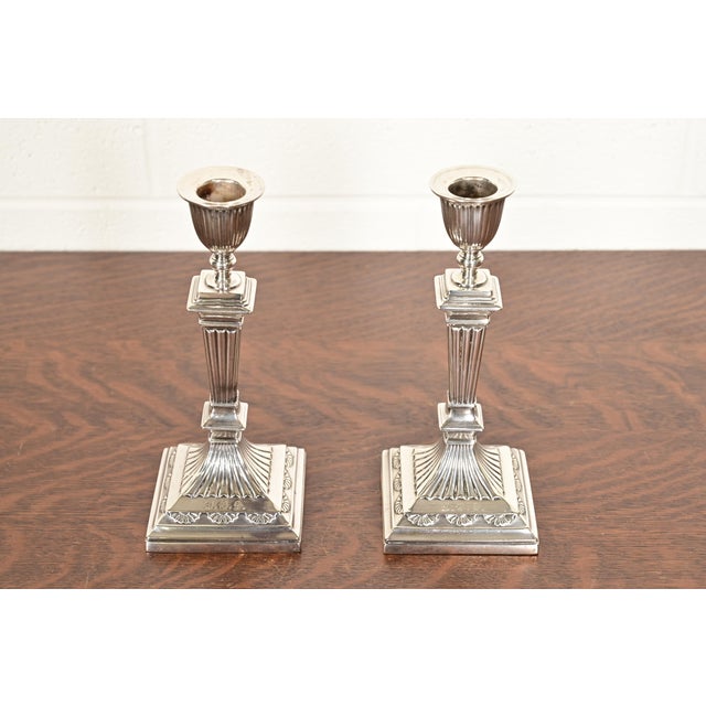 A gorgeous pair of antique Neoclassical or Victorian silver soldered candlesticks By Tiffany & Co. (each signed to the...