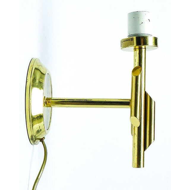 The wall lamp probably comes from the 1980s. Preserved in very good condition. This piece has an attribution mark, I am...