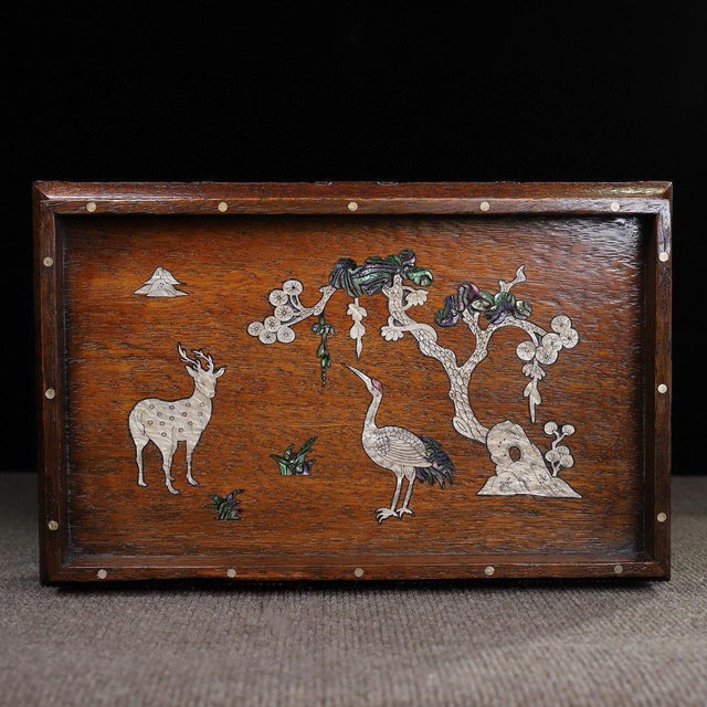 A beautifully crafted Chinese rectangular tray or display stand, likely made of Huali (rosewood). The piece features a low...