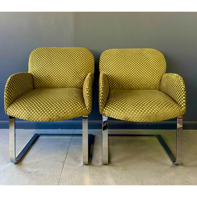 These lounge chairs, inspired by the iconic designer Milo Baughman, feature a sleek flat bar design and are upholstered in...