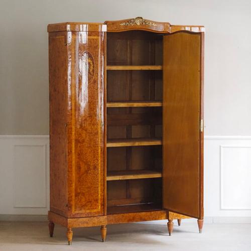 This large, elegant wardrobe dates from the late 19th century and follows a historicist design language prevalent in...