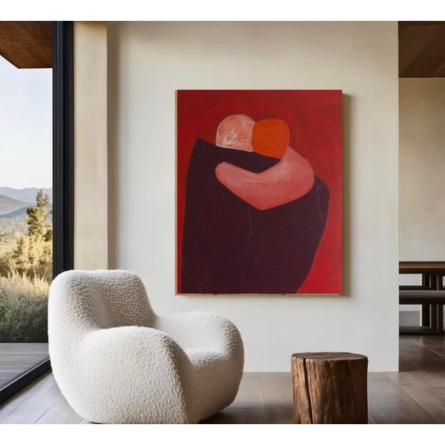In this minimalist composition with deep shades of red, burgundy, and dusty rose, two figures embrace in a silent,...