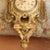 A substantial and decorative carved gilt wood Swedish cartouche form clock in the traditional bold Gustavian manner...
