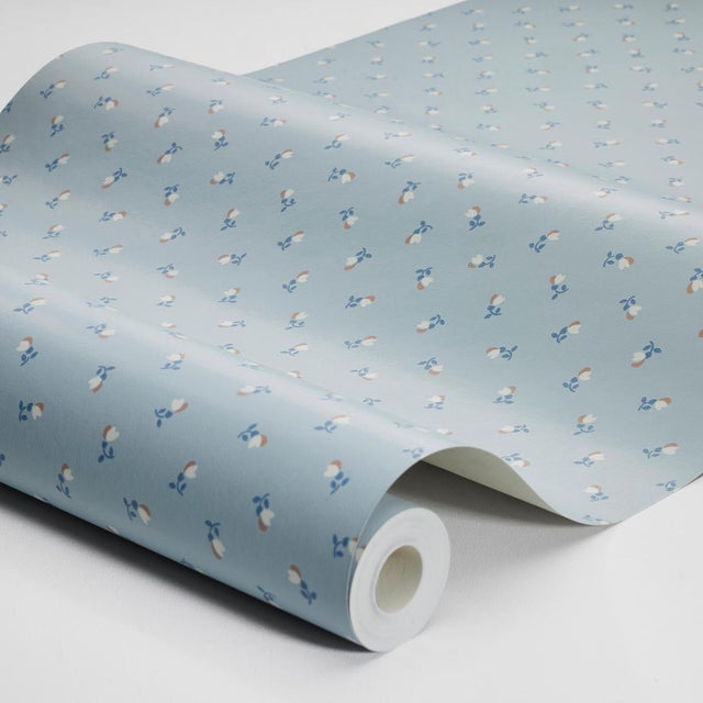 Sweet and simple, Petite Chérie is a delicate small-scale floral pattern. This charming surface-printed wallpaper is a...