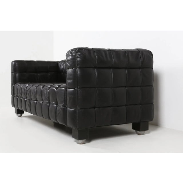 Black leather Kubus sofa model ''8020'' designed by Josef Hoffmann for Wittmann. This Kubus sofa is designed in 1910 for...