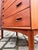 This Danish chest of drawers is a rare and high-quality piece of mid-century design, distinguished by both its...