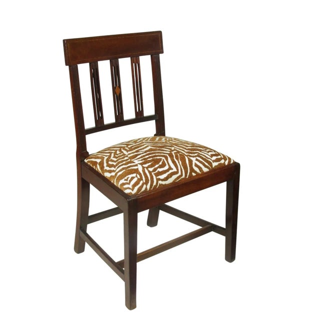 A pair of 19th-C. English Regency inlaid mahogany side chairs with hand carved details and new Brunshwig and Fils...