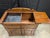 Solid Virginia House rustic pine dry sink cabinet with a rich true brown finish and classic brass hardware. Features two...