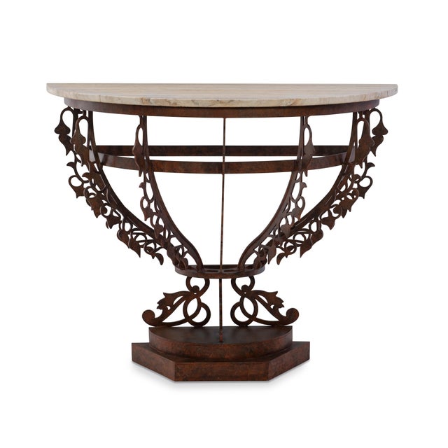 A captivating balance of strength and artistry, this remarkable console pairs a sculptural, hand-forged metal base with a...