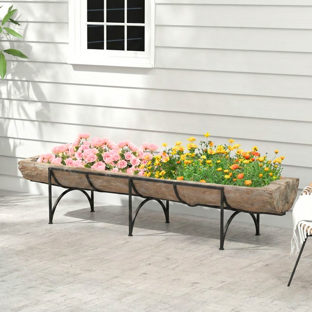 Dimensions: 114" Wide X 23" Deep X 23" High This is an antique trough carved out of a single tree trunk. It was used to...