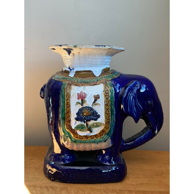 This vintage painted terracotta elephant low stool brings playful, artisanal charm rooted in Mid-Century Modern...