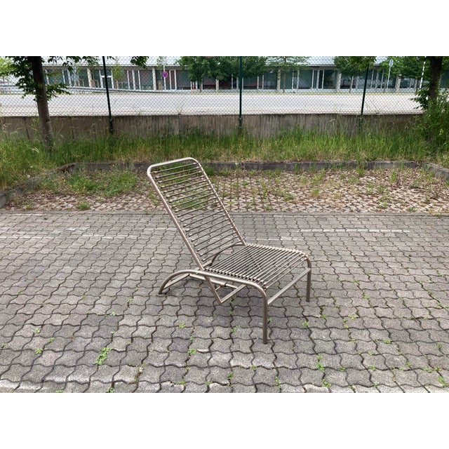 Iconic Sandow lounge chair (chaise longue) designed by René Herbst and produced by Ecart International. One of the most...