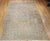 A captivating vintage Turkish Oushak rug from the mid 1900s. This room-size piece features a rare and highly desirable...