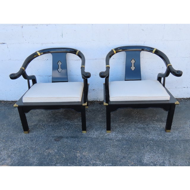 This charming Pair of Chairs is made of wood, and fabric. These two chairs have exquisitely elegant Hollywood Regency...