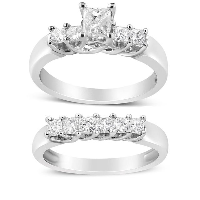 This 14k white gold diamond bridal set features a striking engagement ring and a matching wedding band. This classic five...