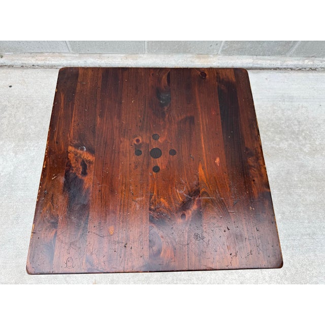 Bring authentic Mid-Century Early American character to your space with this rare, heavy-set vintage pedestal accent table...